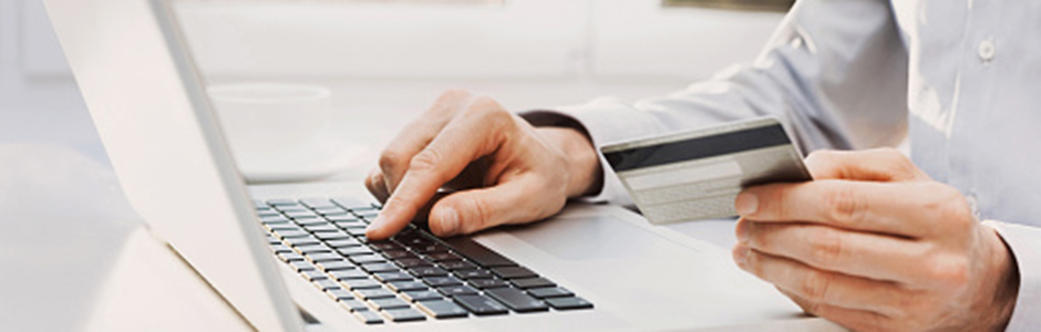 Patient is paying a bill using their laptop
